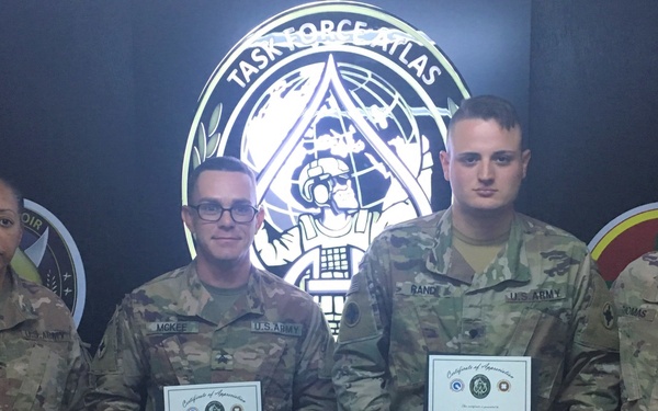 McKee and Rand Recognized for Service