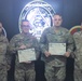 Rand and McKee Receive Former Wartime Service Shoulder Insignia