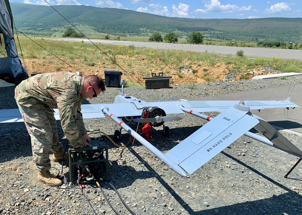 Soldier de-fuels RQ-to 7B V2 Shadow Unmanned Aircraft