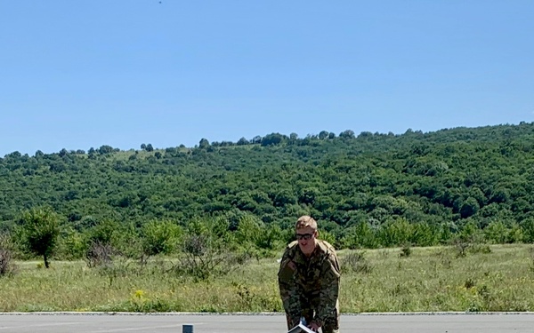 Soldiers prepares to load a RQ-to 7B V2 Shadow Unmanned Aircraft