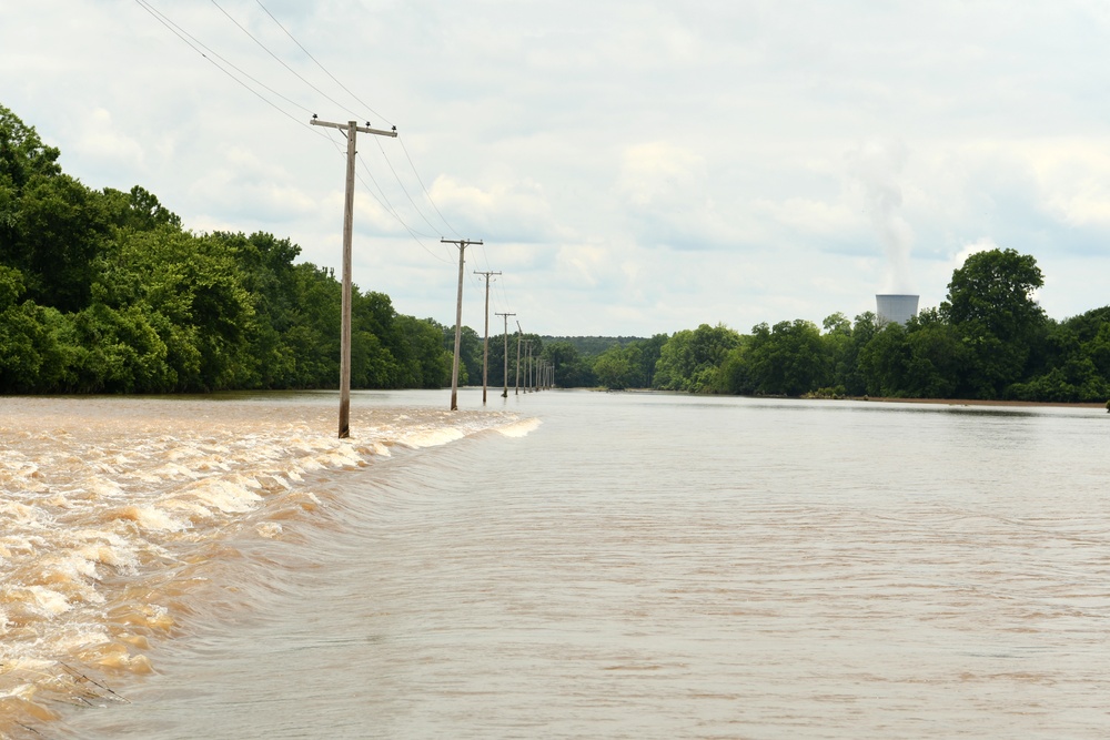 Flood Waters Cross Over a Roadway