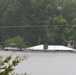 Flood Waters Almost Cover Houses