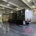 Soldiers and Marines load equipment aboard the U.S.N.S. Watkins (T-AKR 315) while moored at Wharf Alpha on Joint Base Charleston, South Carolina