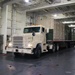 Soldiers and Marines load equipment aboard the U.S.N.S. Watkins (T-AKR 315) while moored at Wharf Alpha on Joint Base Charleston, South Carolina