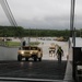 Soldiers and Marines load equipment aboard the U.S.N.S. Watkins (T-AKR 315) while moored at Wharf Alpha on Joint Base Charleston, South Carolina