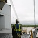 Soldiers and Marines load equipment aboard the U.S.N.S. Watkins (T-AKR 315) while moored at Wharf Alpha on Joint Base Charleston, South Carolina