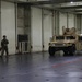 Soldiers and Marines load equipment aboard the U.S.N.S. Watkins (T-AKR 315) while moored at Wharf Alpha on Joint Base Charleston, South Carolina