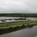 Soldiers and Marines load equipment aboard the U.S.N.S. Watkins (T-AKR 315) while moored at Wharf Alpha on Joint Base Charleston, South Carolina