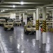 Soldiers and Marines load equipment aboard the U.S.N.S. Watkins (T-AKR 315) while moored at Wharf Alpha on Joint Base Charleston, South Carolina