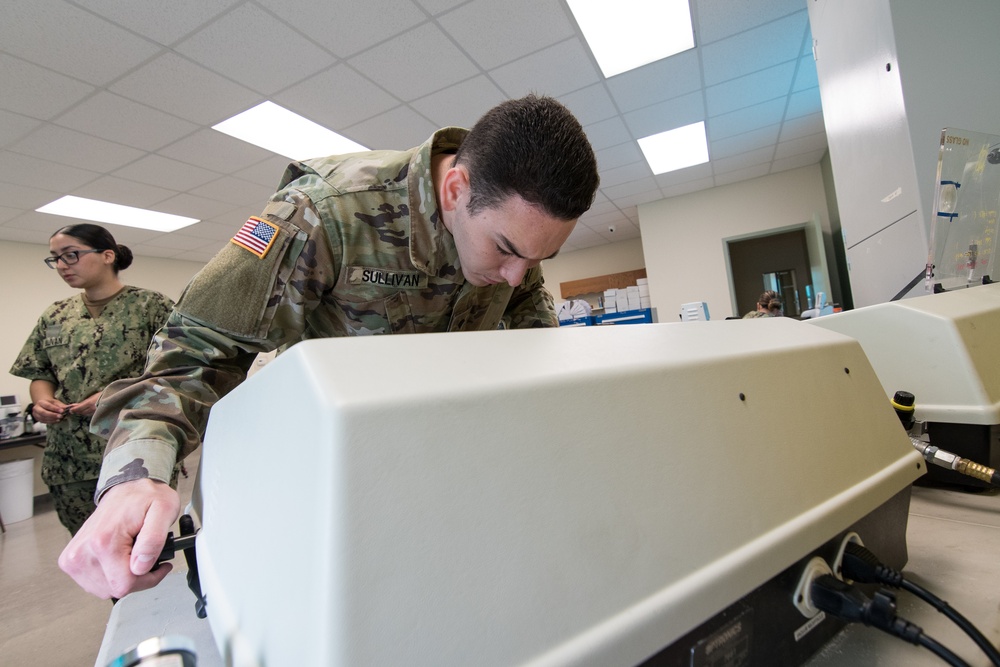 Sailors make no-cost eyeglasses for community during IRT mission