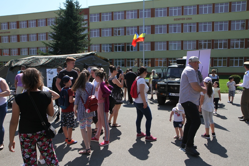 Civilians around military attractions at static display event
