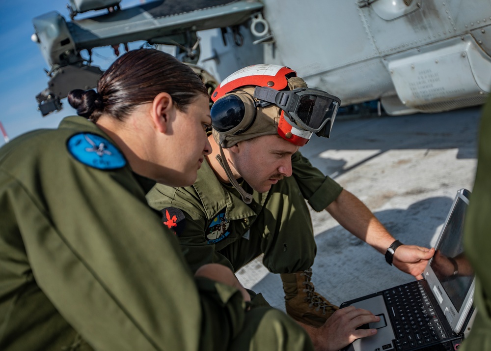 MAG-41 Marines conduct maintenance checks in Canada