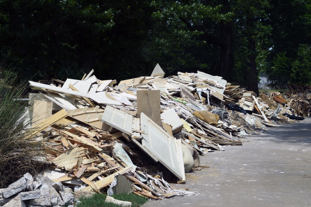 Debris Piles in Neighborhoods Impacted by Recent Flooding in Arkansas