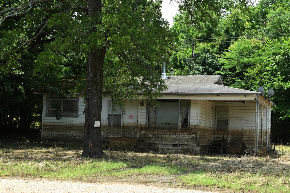 Water Marks From the Recent Flooding  Are Seen on the Side of a House