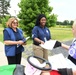 Disaster Survivor Assistance Teams and FEMA Corps Canvas Areas in Lavaca, Arkansas Impacted by Recent Flooding