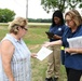 Disaster Survivor Assistance Teams and FEMA Corps Canvas Areas in Lavaca, Arkansas Impacted by Recent Flooding