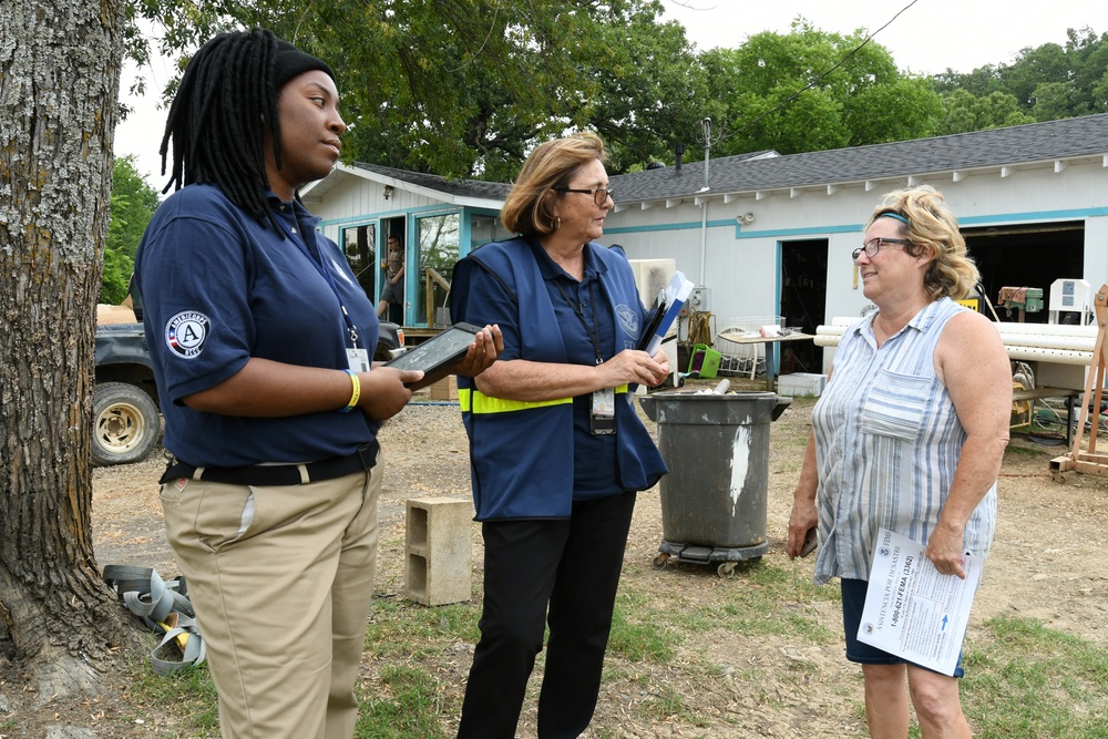 Disaster Survivor Assistance Teams and FEMA Corps Canvas Areas in Lavaca, Arkansas Impacted by Recent Flooding