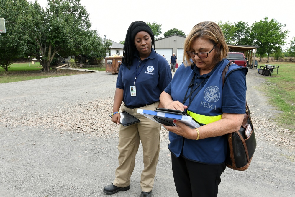 Disaster Survivor Assistance Teams and FEMA Corps Canvas Areas in Lavaca, Arkansas Impacted by Recent Flooding