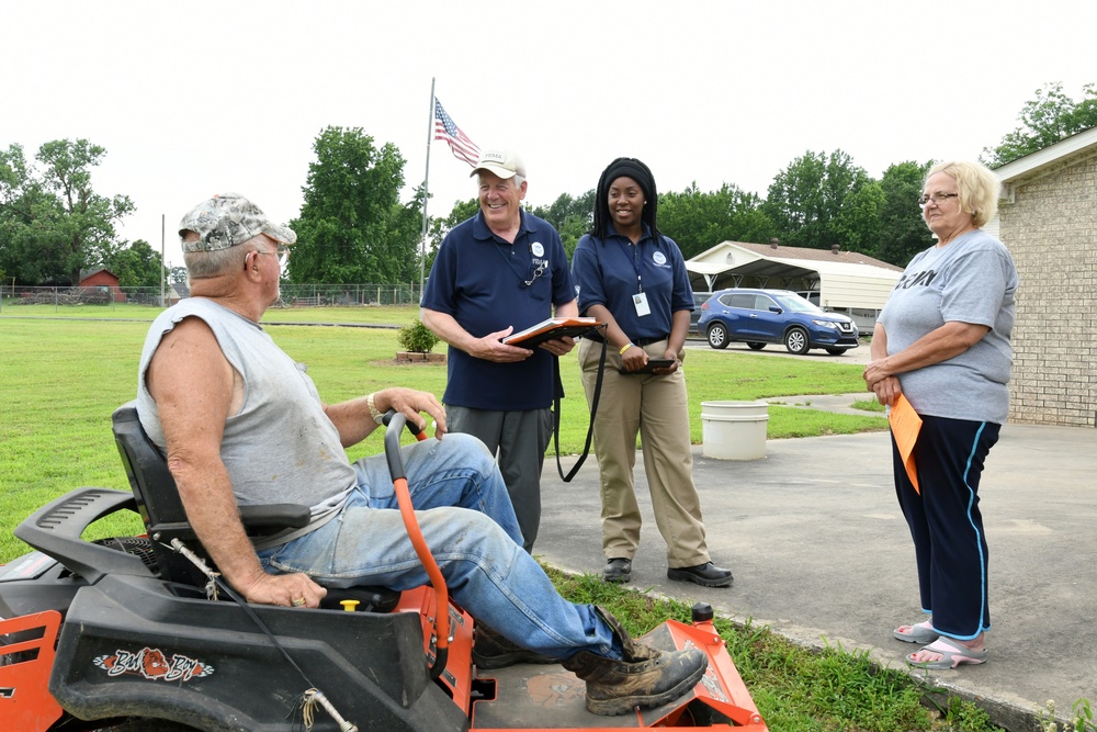 Disaster Survivor Assistance Teams and FEMA Corps Canvas Areas in Lavaca, Arkansas Impacted by Recent Flooding