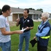 FEMA Disaster Survivor Assistance Members Talk to a Resident in Scott, Arkansas