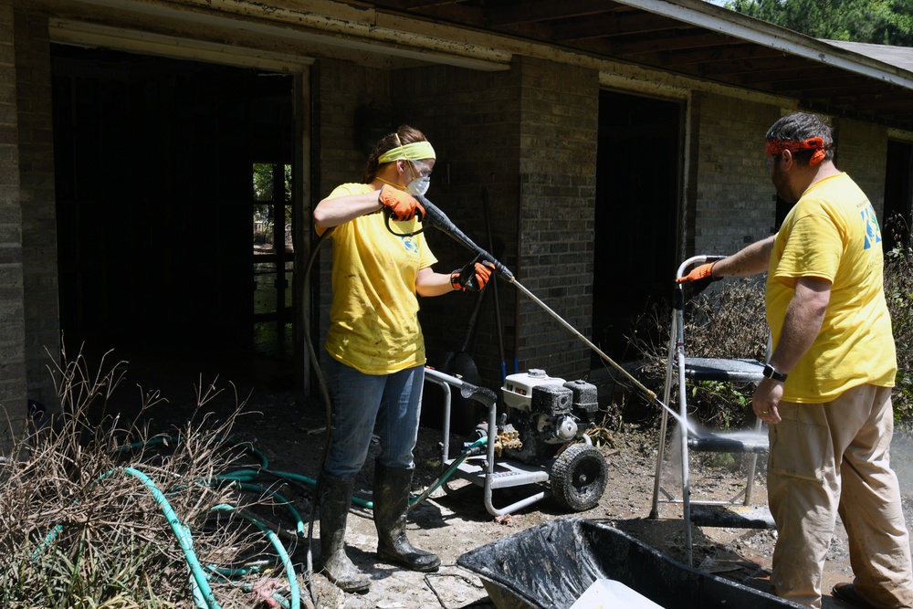 Local Church Members Help Cleanup a House Impacted by Recent Flooding