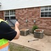 A FEMA Inspector Inspects a House Damaged by Recent Arkansas Flooding