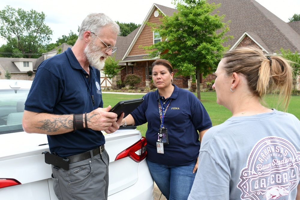 FEMA Disaster Survivor Assistance Teams Check on the Status of a Resident's FEMA Application