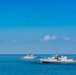A B-52 Stratofortress flies over French Tripartite-class mine warfare ship FS Pegase (M644), left, and Norwegian Oskoy-class mine hunter HNoMS Hinnoy after dropping inert training mines during exercise Baltic Operations (BALTOPS) 2019