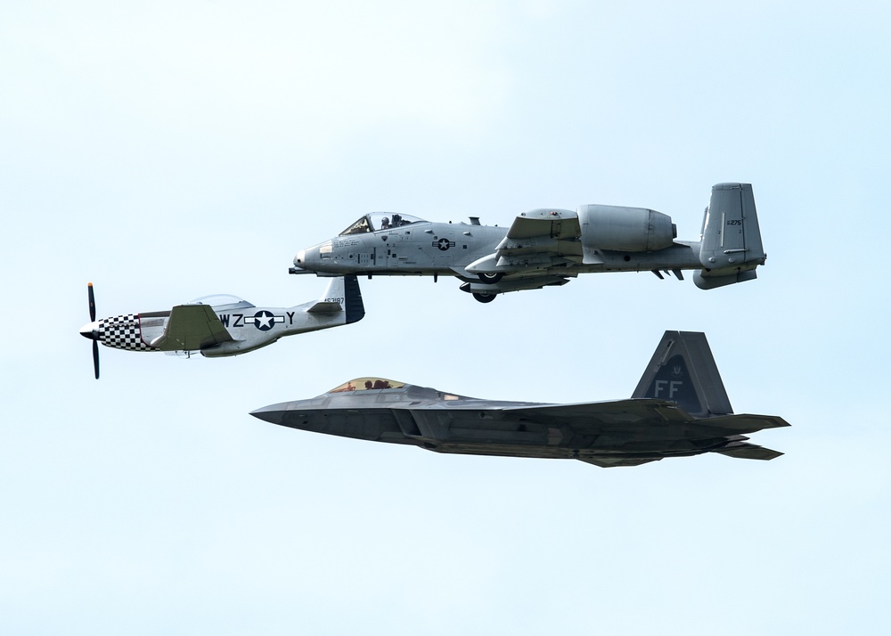 DVIDS Images A F22, A10C, and P51D fly in a formation at the