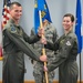 Lt. Col. Ian Cunningham gives the guidon to Lt. Col. Nicola Polidor during the 29th TSS Det 5 change of command ceremony