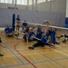 Warriors practice Sitting Volleyball