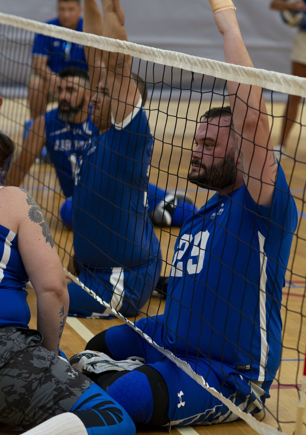 Warriors practice Sitting Volleyball