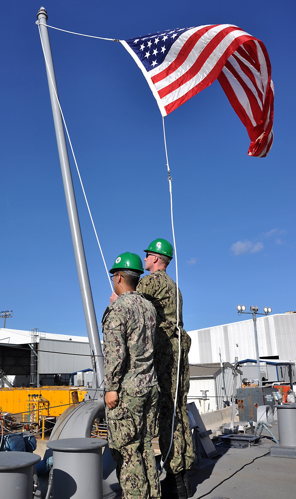 USS Fitzgerald hoists commemorative flag