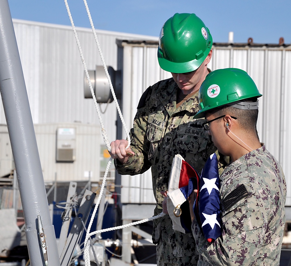 USS Fitzgerald hoists commemorative flag