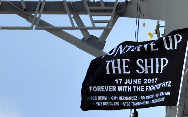 USS Fitzgerald hoists commemorative flag