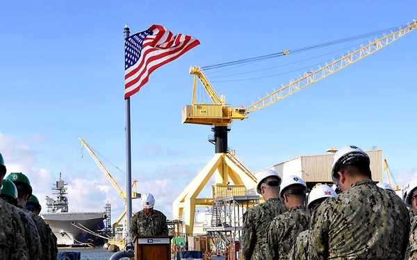 USS Fitzgerald hoists commemorative flag