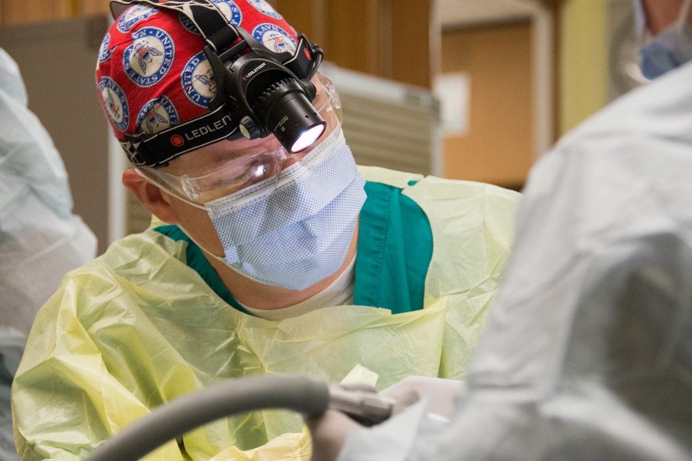 Navy Dentist Operates During IRT Mission