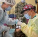 Navy Dentist Operates During IRT Mission