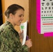 Hospital Corpsman Tests Patients Eyesight Suring IRT Mission