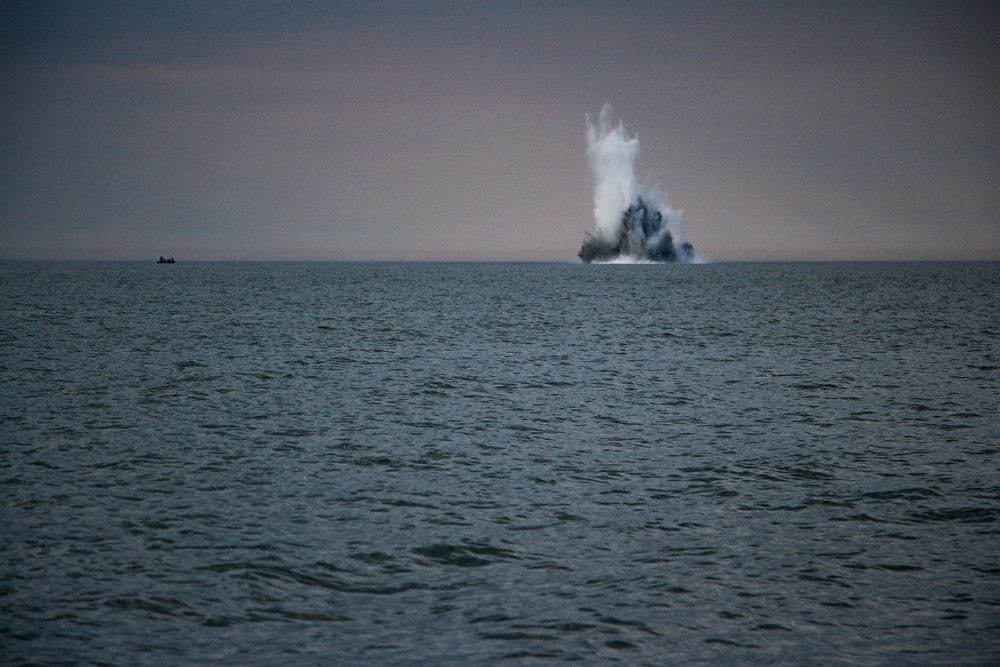 HDMS Soloven (P563), Flyvefisken-class PV, anchors in the Baltic Sea during underwater detonations conducted by Norwegian, Belgian and U.S. forces.