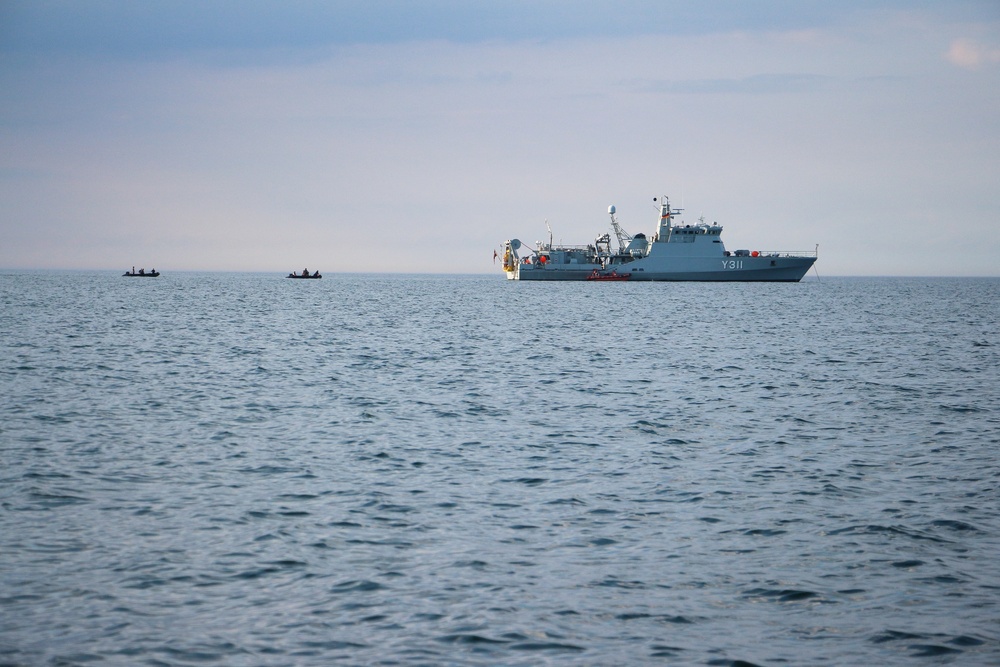 HDMS Soloven (P563), Flyvefisken-class PV, anchors in the Baltic Sea during underwater detonations conducted by Norwegian, Belgian and U.S. forces.