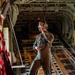 U.S. Marine Corps KC-130 Hercules refuel Canadian aircraft in the air