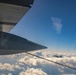 U.S. Marine Corps KC-130 Hercules refuel Canadian aircraft in the air