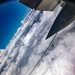 U.S. Marine Corps KC-130 Hercules refuel Canadian aircraft in the air