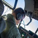 U.S. Marine Corps KC-130 Hercules refuel Canadian aircraft in the air