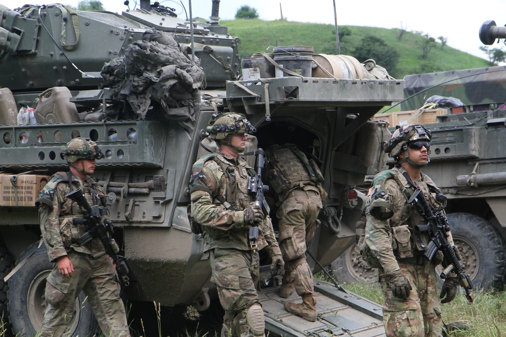 Soldiers from 2d Cavalry Regiment prepare for base defense