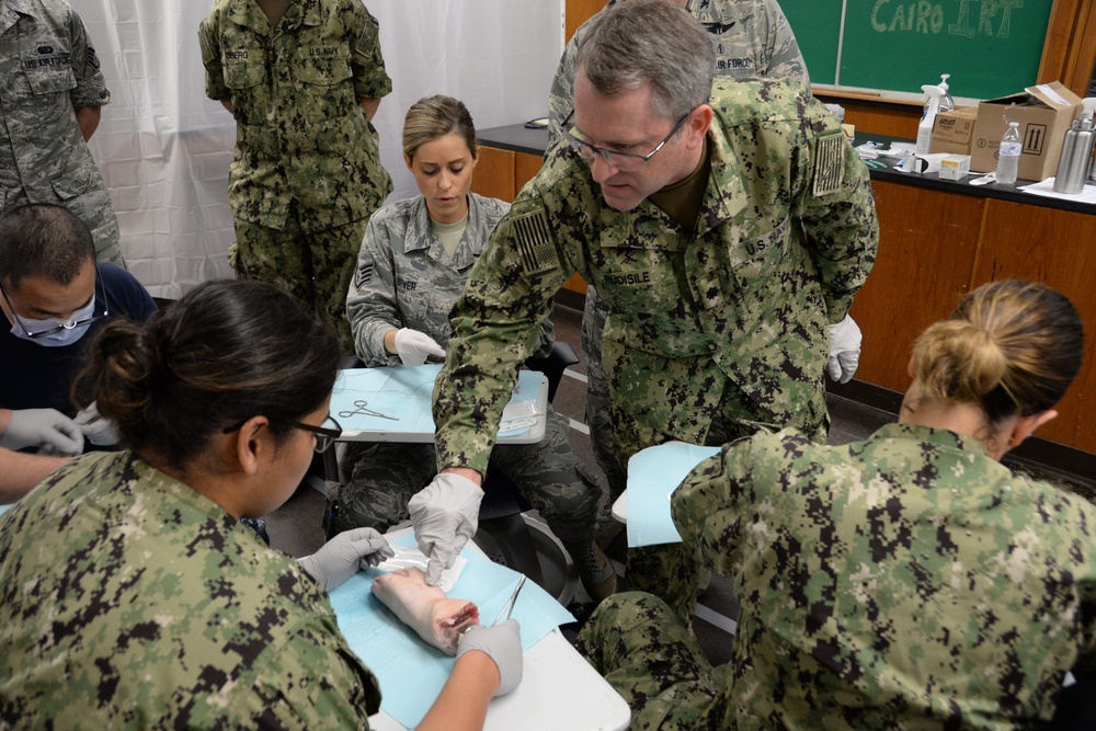 Medical Personnel Practice Suture Techniques During IRT Mission