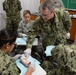 Medical Personnel Practice Suture Techniques During IRT Mission