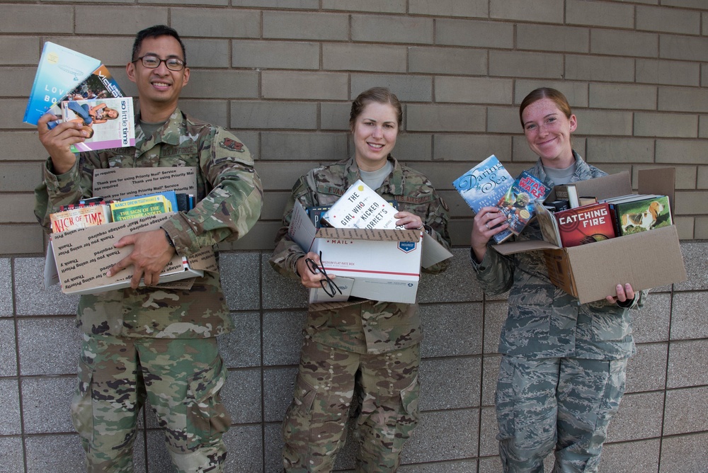 Service Members Donate Books to Local High School
