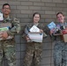 Service Members Donate Books to Local High School